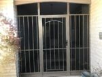 Custom steel porch enclosure with stainless steel security mesh installed in Glen Waverley.jpeg